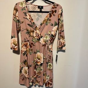 Pink dress never worn! Tags are still on. Size medium